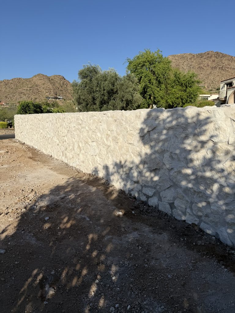 Finished CMU block retaining wall built by TJ Landscape in Phoenix, AZ